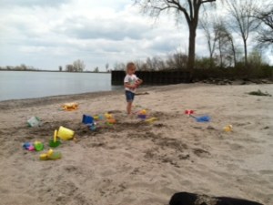 Lo and Honey blowing bubbles at the beach.